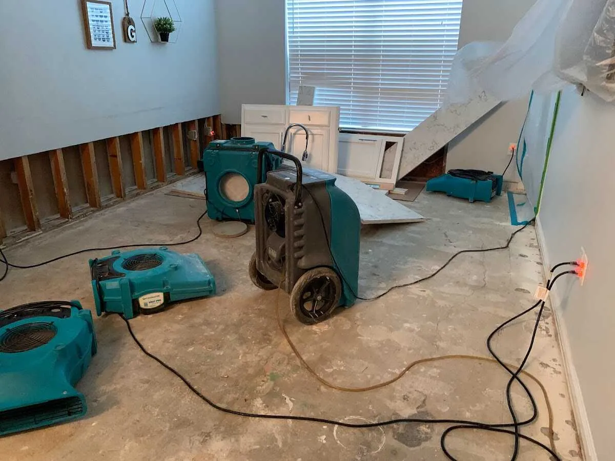 Dehumidifier in flood-cut room for Water Damage Restoration in Fayetteville